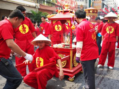caption : Procession of Chinese New Year Festival at hundred anniversary year in the city. Strong men carrying gods symbol with litter by alternation.<br>Date   : 11 Feb 2016<br>Rights  : Santibhavank P<br>License : copyrights<br>