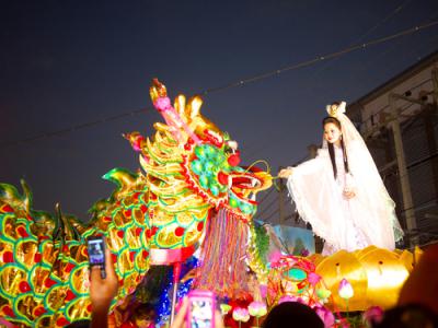 caption : Guan Yin Goddess comes to pick up the dragon back to heaven at the end of procession in Chinese New Year Festival on January 26,2012 in Nakhonsawan.<br>Date   : 26 Jan 2012<br>Creator : Santibhavank P / Shutterstock.com<br>Rights  : Santibhavank P<br>License : copyrights<br>